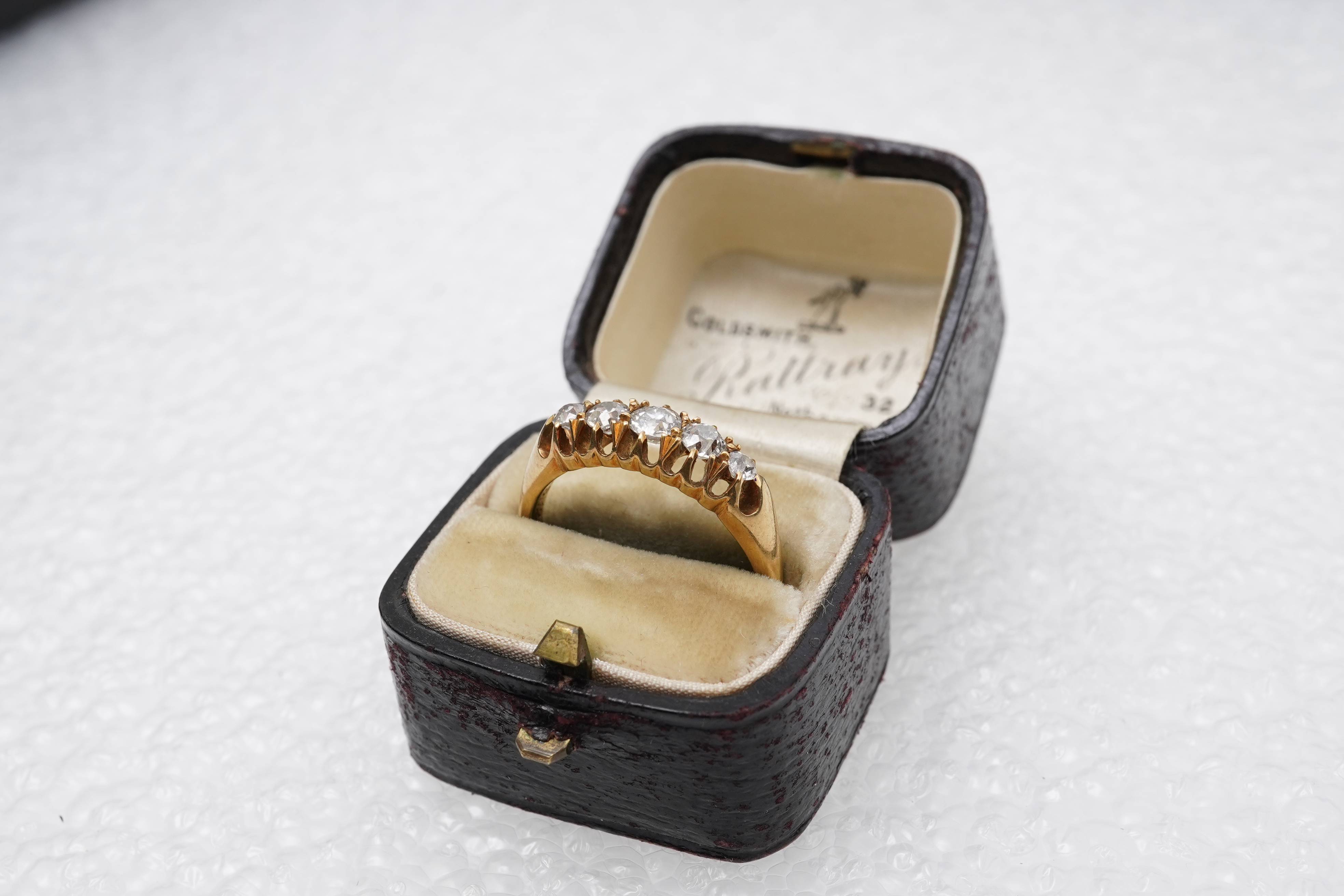 An Edwardian five-stone diamond ring, circa 1903